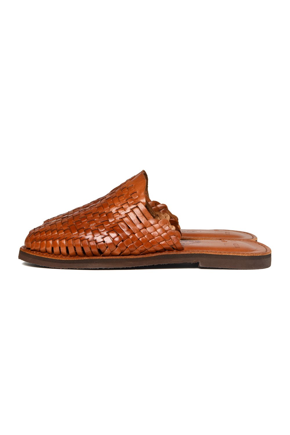 Side view of women’s Chamula leather slip-on huarache with woven design