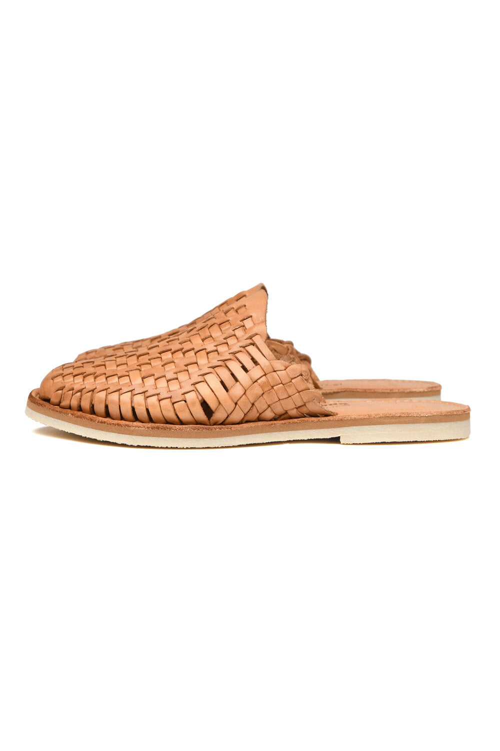 Side view of women’s Chamula leather slip-on huarache with woven design
