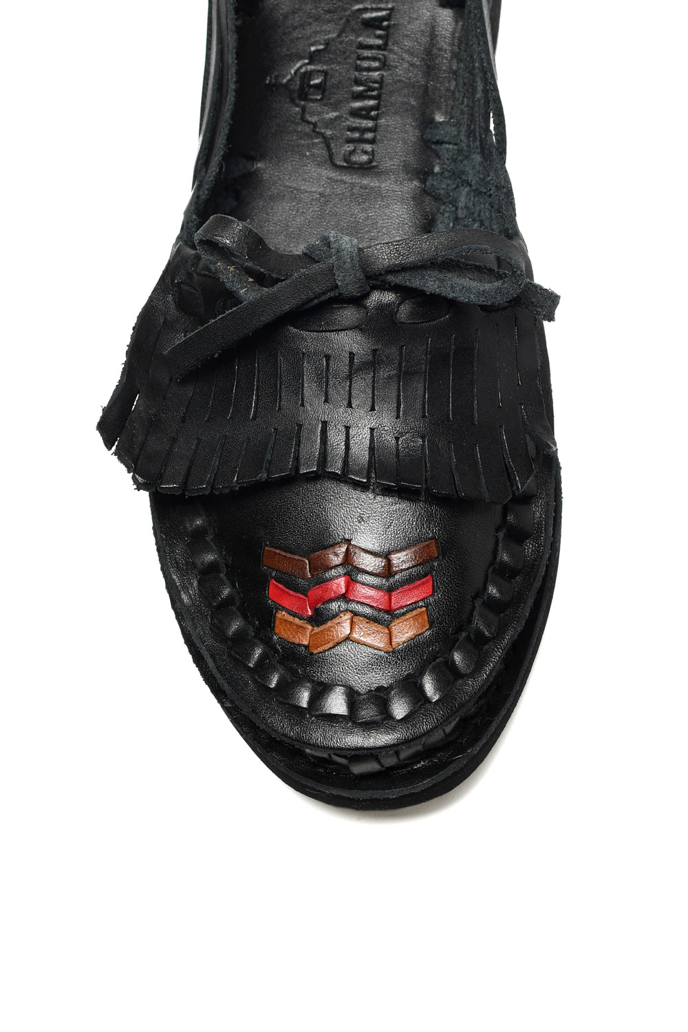 Close-up of handwoven leather detailing on Mexican huarache sandal