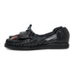 Side view of women’s Chamula leather slip-on huarache with woven design