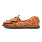 Side view of women’s Chamula leather slip-on huarache with woven design