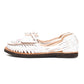 Side view of women’s Chamula leather slip-on huarache with woven design