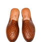Top-down view of traditional woven leather huarache sandal made in Mexico
