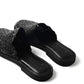 Rear view of Chamula’s huarache showing heel stitching and slip-on shape