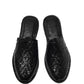 Top-down view of traditional woven leather huarache sandal made in Mexico